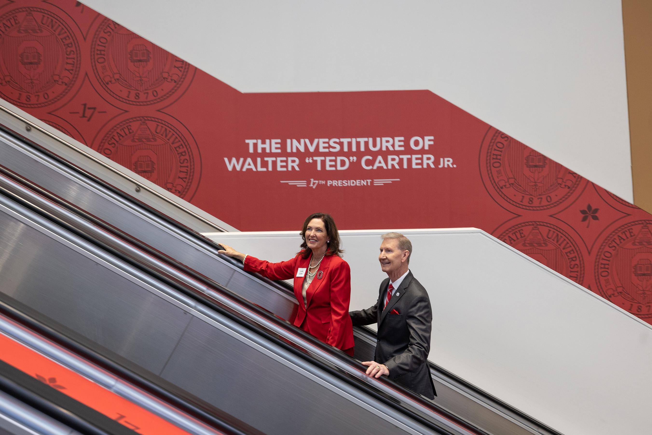 Ted Carter going up the OSU branded escalators