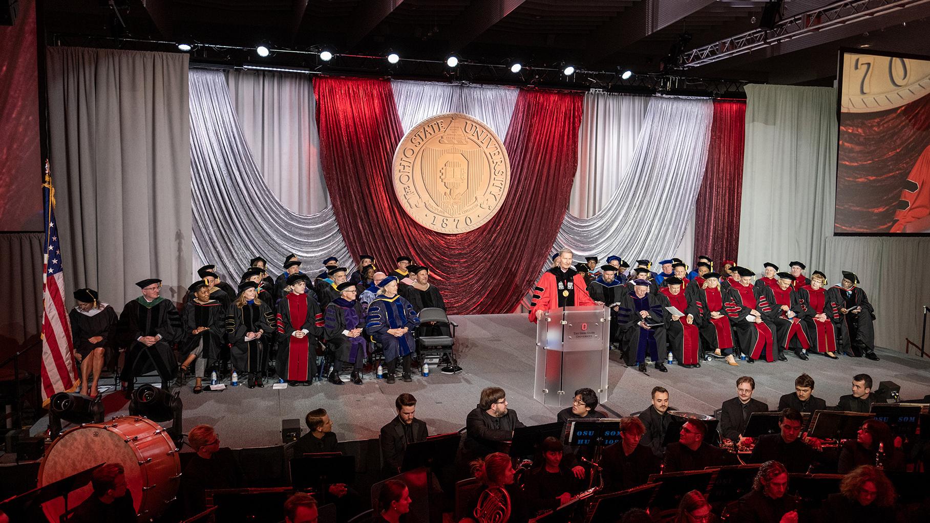 Wider stage with seal during Investiture presentation