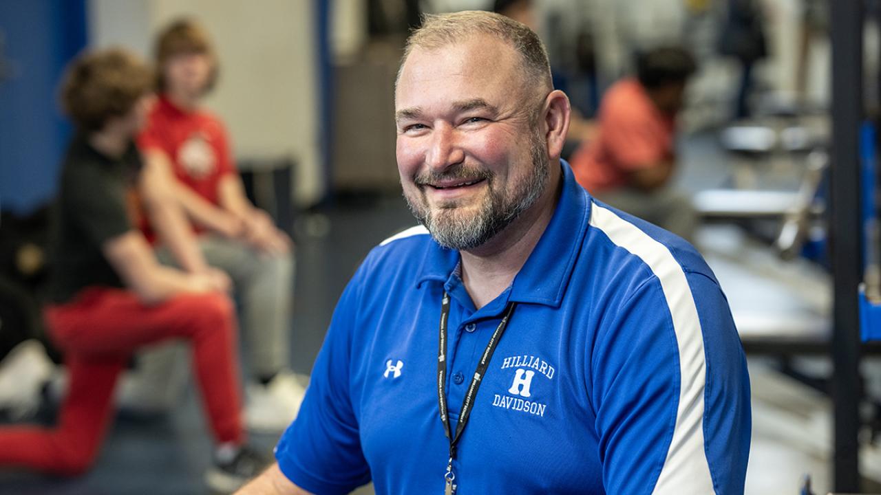 A portrait of Hilliard Davidson girls track and field coach Matt Beatty