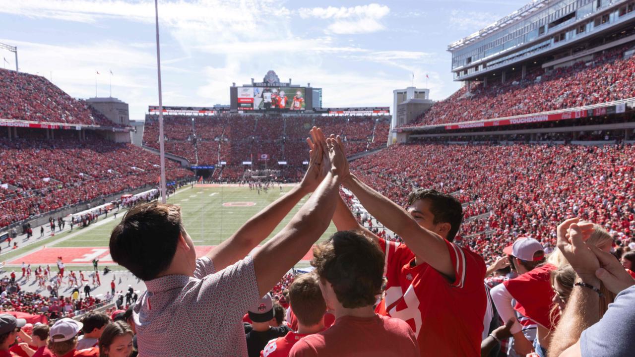Fans cheer on the Buckeyes at Ohio Stadium